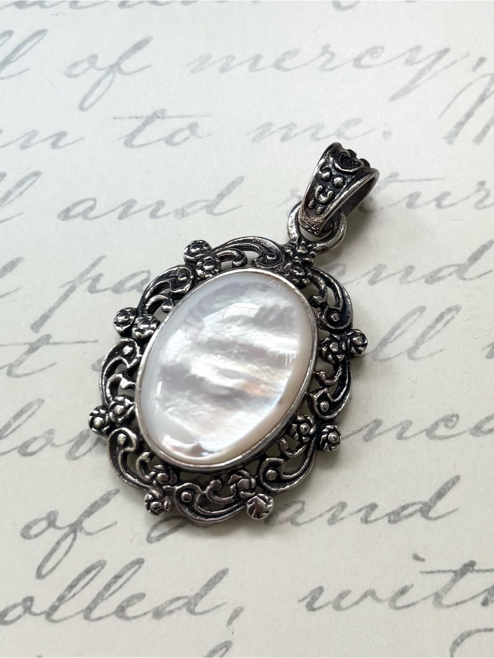 Sterling Silver White Mother of Pearl Oval Floral Pendant